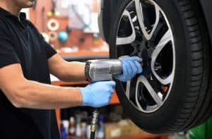 Mechanic repairing tyres